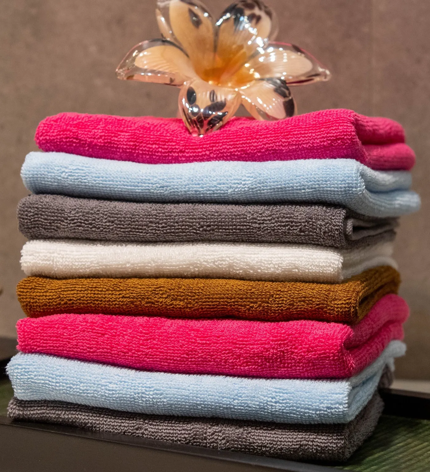 A stack of textured blue and white towels