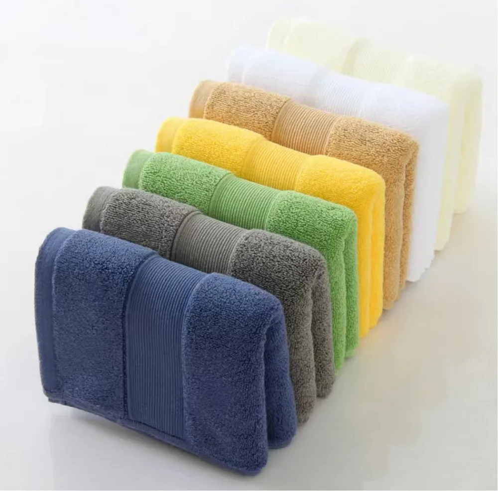White Majesty towels styled in a bright bathroom